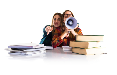 Students shouting by megaphoneの写真素材