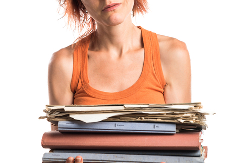 Woman holding several college notesの写真素材