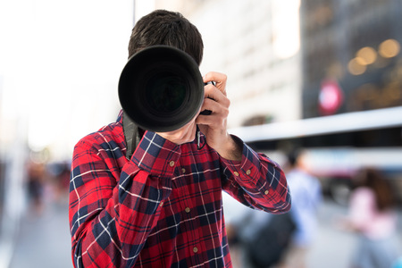 Photographer taking a photoの写真素材
