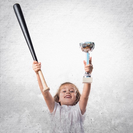 Kid playing baseballの写真素材