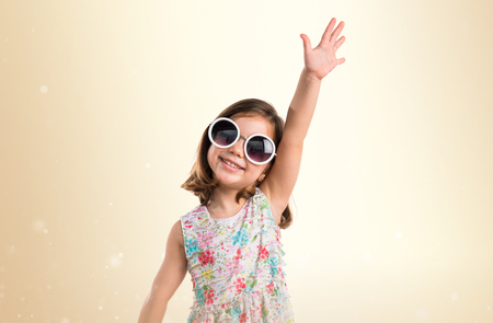 Happy girl with sunglassesの写真素材