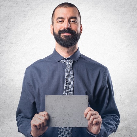 Man holding an empty placardの写真素材