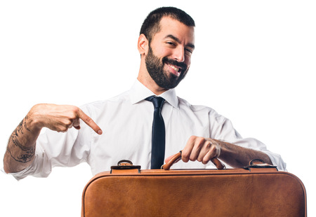 Businessman holding a briefcaseの写真素材