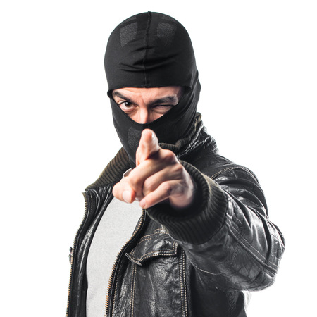 Robber pointing to the frontの写真素材