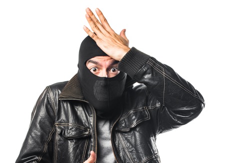 Robber having doubtsの写真素材