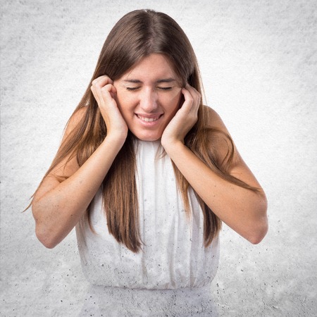 Girl covering her earsの写真素材