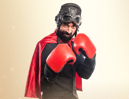 Super hero businessman with boxing glovesの写真素材