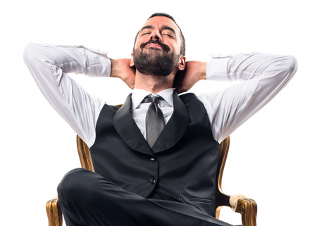 Businessman sitting on armchairの写真素材