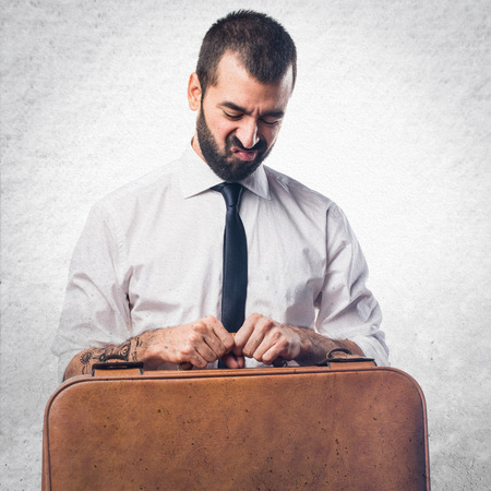 Businessman holding a briefcaseの写真素材