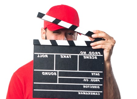 Pizza delivery man holding a clapperboardの写真素材