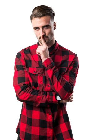 Handsome man making silence gestureの写真素材