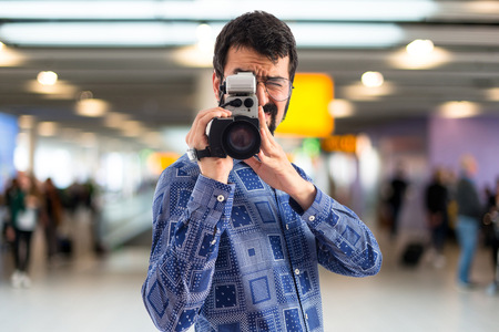 Vintage young man filming