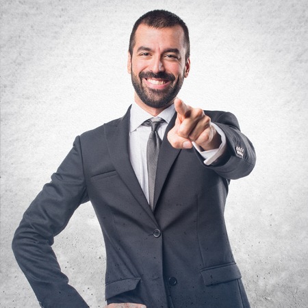 Businessman pointing to the frontの写真素材