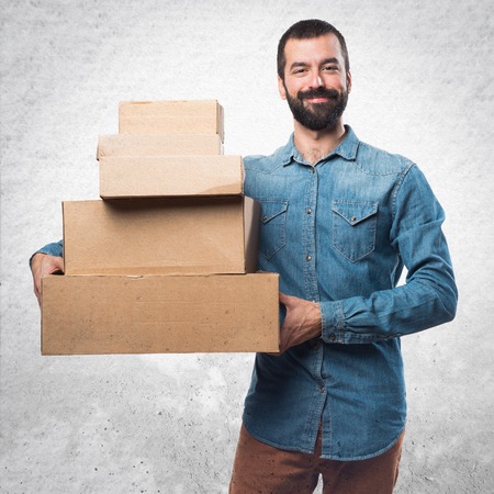 Man holding boxesの写真素材