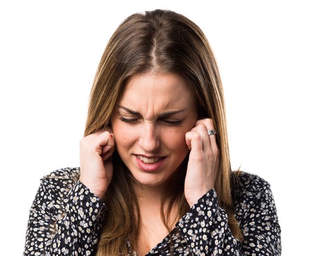 Blonde woman covering his ears