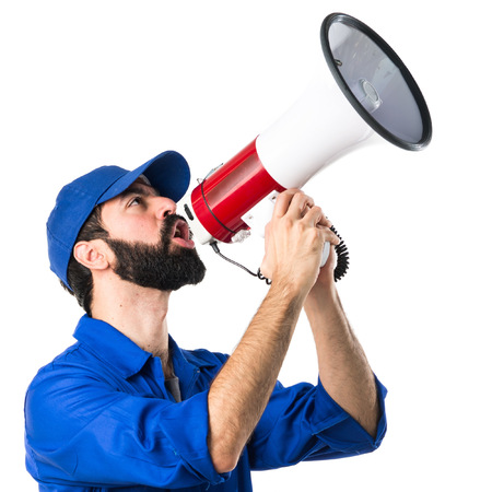Plumber shouting by megaphoneの写真素材