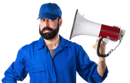 Plumber shouting by megaphoneの写真素材