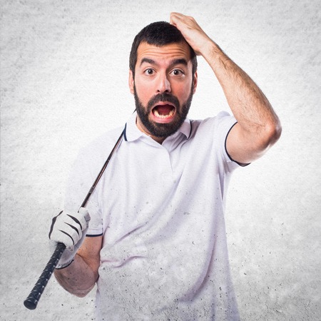 Golfer doing surprise gestureの写真素材