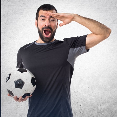 Football player showing somethingの写真素材
