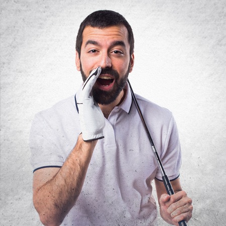 Golfer shoutingの写真素材