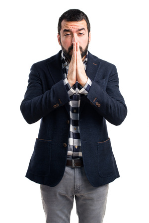 Handsome man pleadingの写真素材