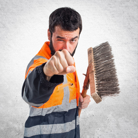 Garbage man giving a punchの写真素材
