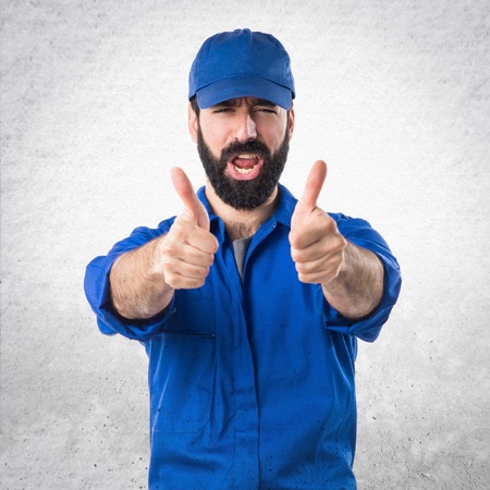 Plumber with thumb upの写真素材