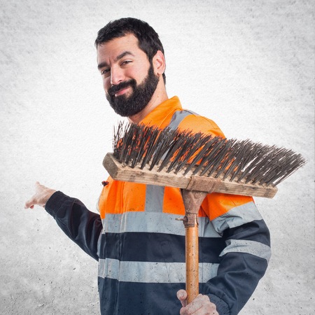 Garbage man pointing backの写真素材
