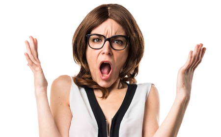 Brunette woman doing surprise gestureの写真素材