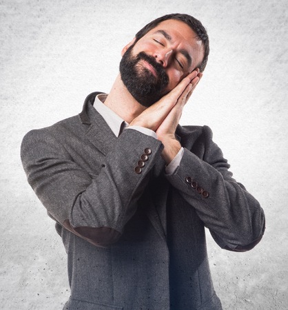 Man doing sleep gestureの写真素材