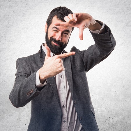 Man focusing with his fingersの写真素材