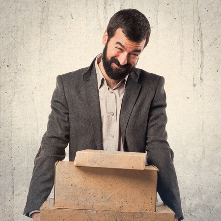 Man holding boxesの写真素材