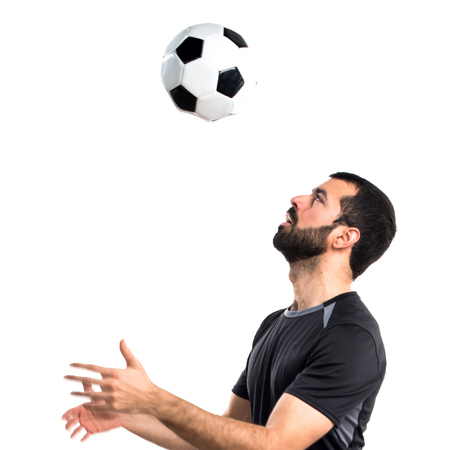 Man playing footballの写真素材