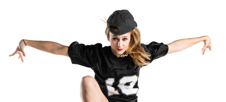 Woman dancing street dance and jumpingの写真素材