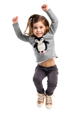 Little girl jumpingの写真素材