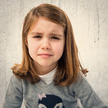 Sad blonde kid