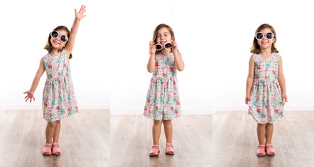 Happy girl with sunglassesの写真素材