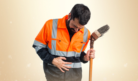 Garbage man with stomachacheの写真素材