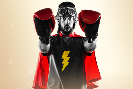 Superhero with boxing gloves making stop signの写真素材