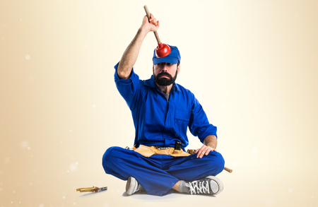 Plumber man with his plungerの写真素材