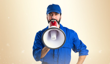 Plumber shouting by megaphoneの写真素材