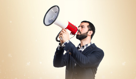 Man shouting by megaphoneの写真素材