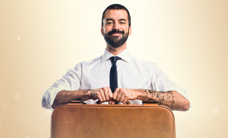Businessman holding a briefcaseの写真素材