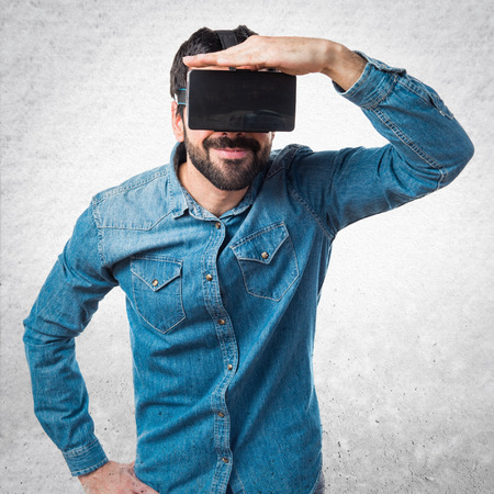 Man using VR glasses showing something