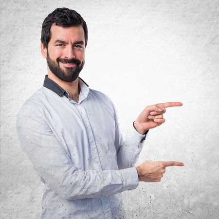 Man pointing to the lateralの写真素材