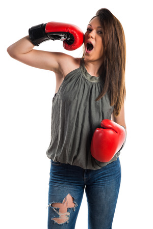 Young girl with boxing glovesの写真素材