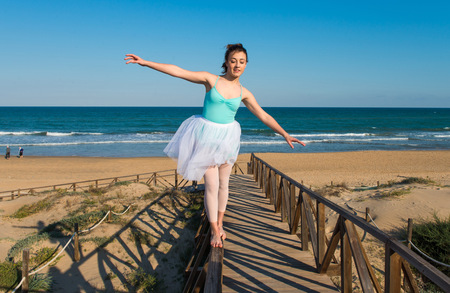 Teenager girl dancing outdoorの写真素材