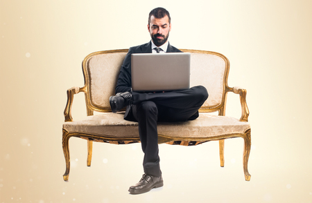 Businessman with laptopの写真素材