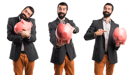 Man holding a piggybankの写真素材