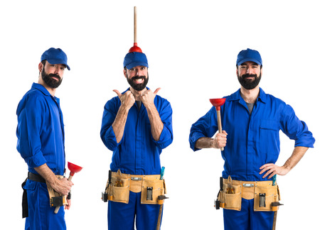 Plumber holding a plungerの写真素材